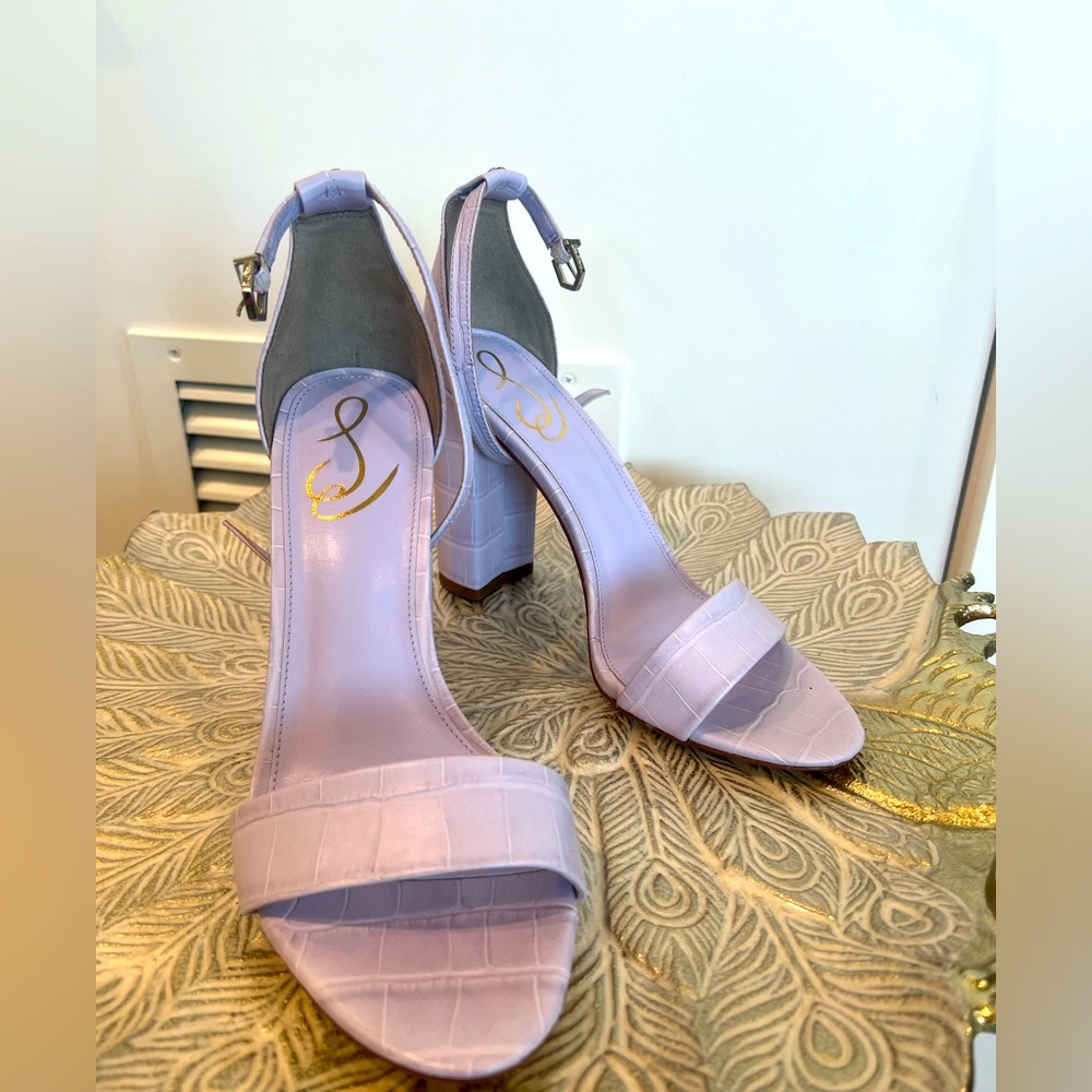 New sandals, never worn. Size 8.5 women’s 
Lilac color